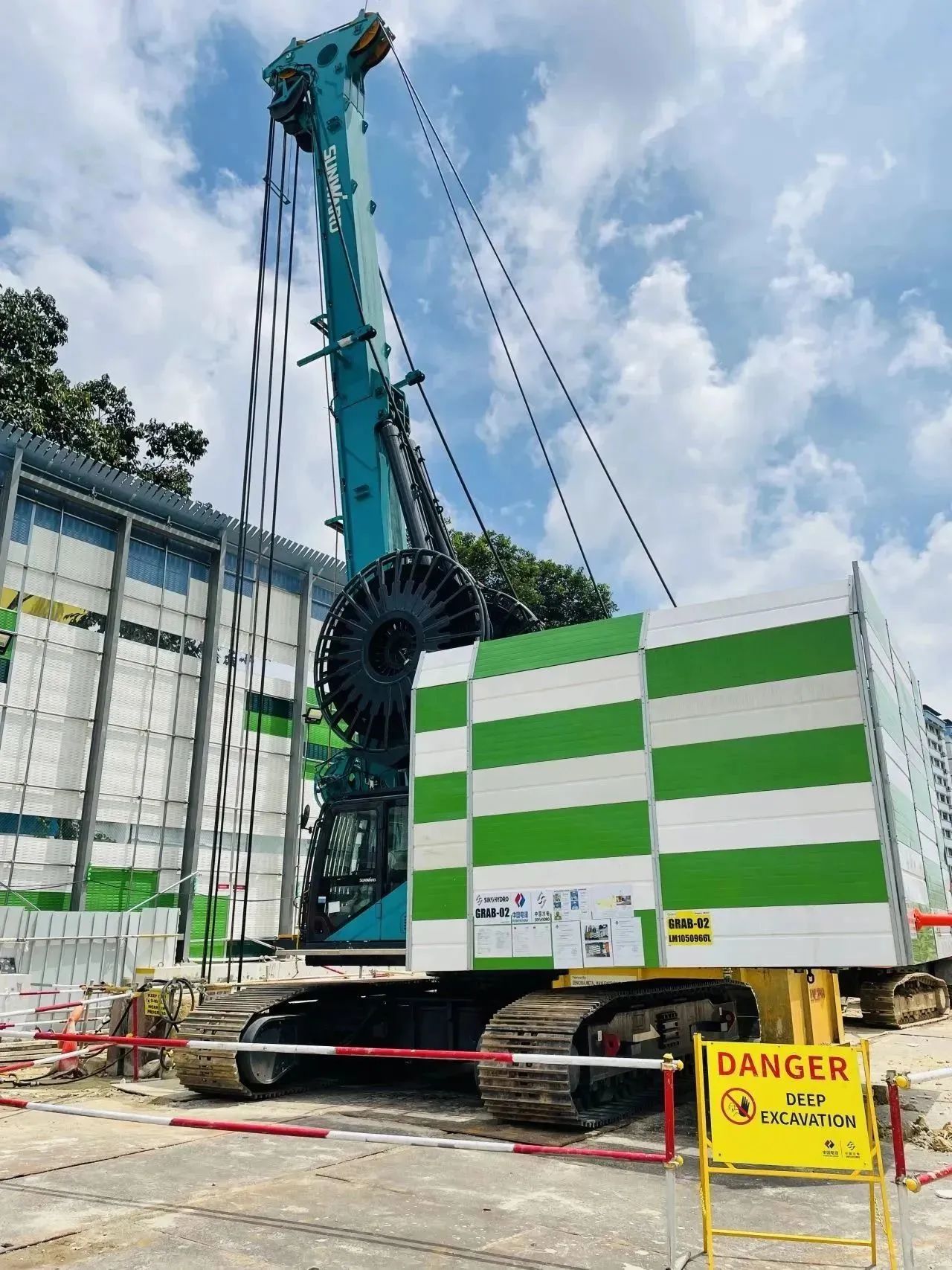 助力海内国际重大工程！！九州ku酷游智能液压抓斗实力“出圈”