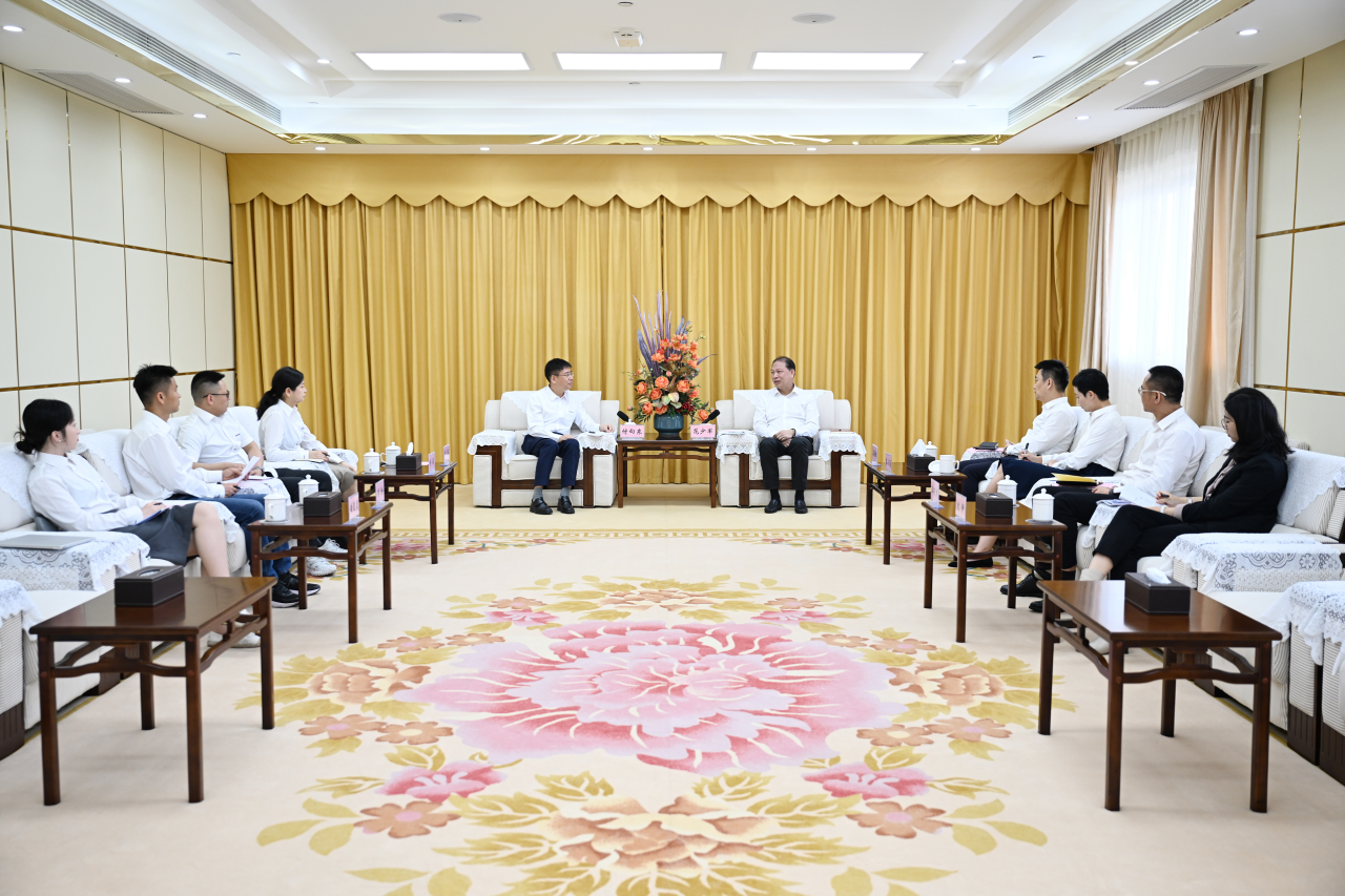 范少军会见九州ku酷游智能董事长付向东